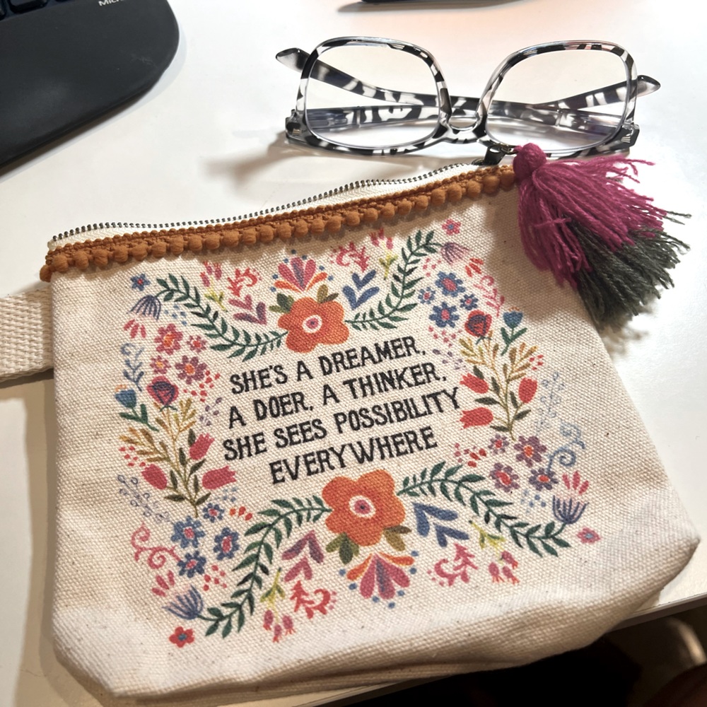 Canvas bag with pom pom. Same on both sides.